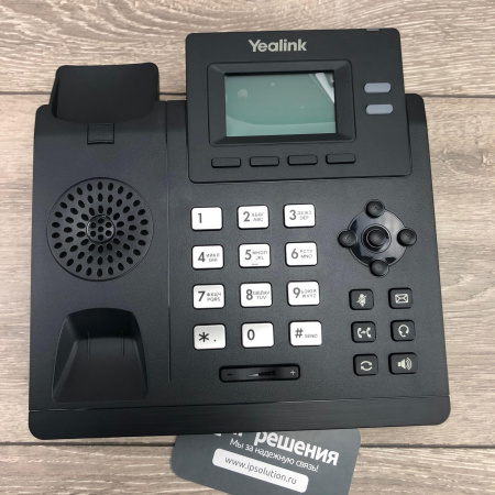 Yealink SIP-T31G, IP-телефон 2 аккаунта, PoE, GigE Yealink SIP-T31G, IP-телефон 2 аккаунта, PoE, GigE
