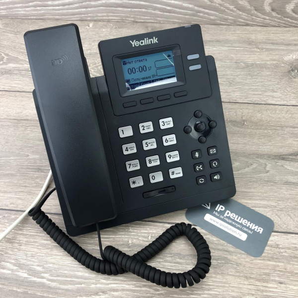 Yealink SIP-T31G, IP-телефон 2 аккаунта, PoE, GigE Yealink SIP-T31G, IP-телефон 2 аккаунта, PoE, GigE